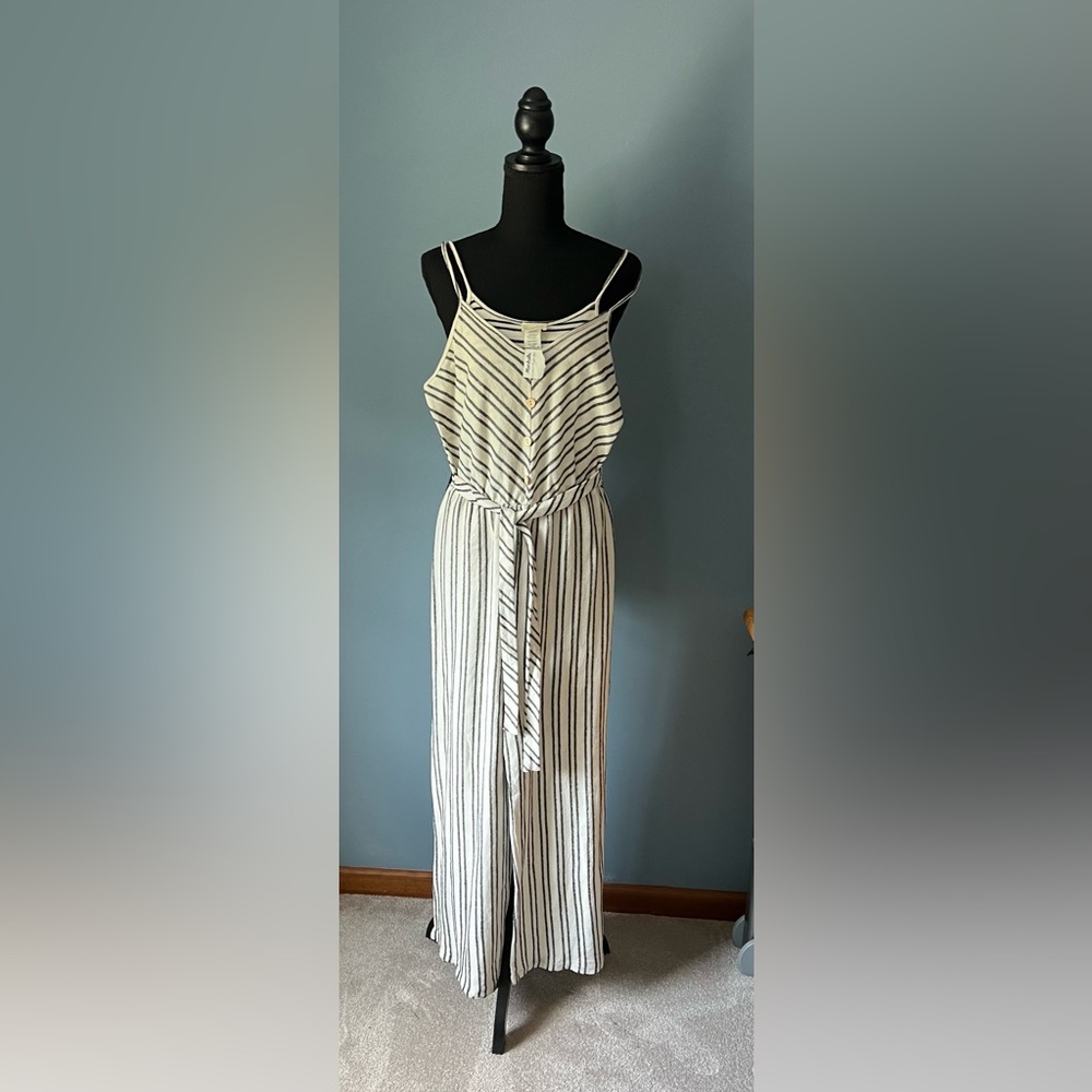 Jumpsuit, Size medium. Color off white with black stripes, new with tags.
